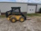 NH LX665 Skidsteer, 1614 Hours, Aux. Hydraulics, Material Bucket, Forks