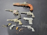 Cap Guns Several older cap type guns, unsure of condition, various styles and brands.