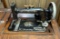 Antique New Home sewing machine in English Oak Case