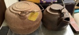 2 iron kettles
