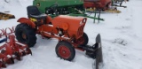 Power King compact tractor with attachments