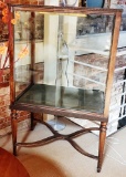 Large antique glass display case on legs