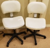 (2) White office chairs