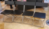 (4) folding chairs