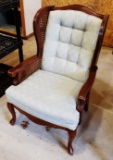 Wicker upholstered armchair