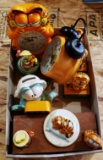 Assorted Garfield items: Including music box and 2 clocks