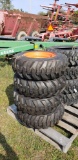 (4) NEW 10x16.5 skidsteer tires mounted on rims