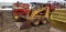 Case 1845B Uni-loader Comes with material bucket and extra wheel, shows 977 hrs we do not believe th