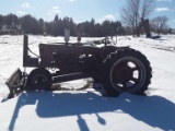 Farmall H tractor with blade