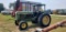 John Deere 2950 tractor 4 post open station with, 2wd, showing 3100 hours