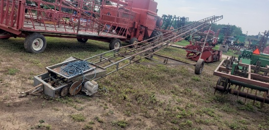 hay bale conveyer on transport