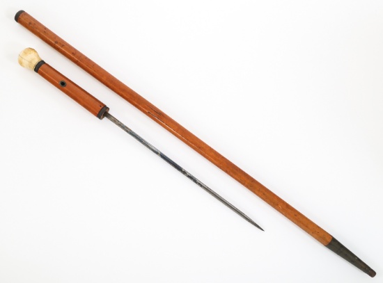19th C. WOOD CANE WITH TRIANGULAR SWORD BLADE