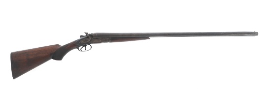 A GREENER 12 GAUGE SIDE BY SIDE SHOTGUN
