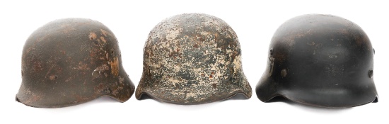 WWII GERMAN DUG RELIC M40 COMBAT HELMETS