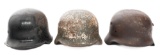 WWII GERMAN DUG RELIC FIREMAN & COMBAT HELMETS