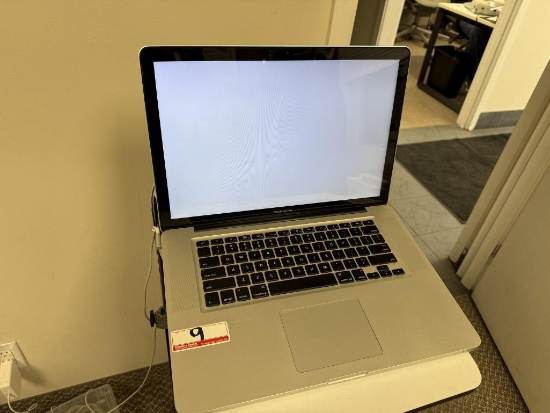 APPLE MACBOOK PRO (A1296) LAPTOP W/ POWER SUPPLY (AS IS - BOOTS TO GREY SCREEN)