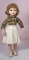 ALEXANDER HARD PLASTIC MAGGIE IN PLAID BLOUSE. $100/150