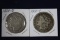 2 Morgan dollars: 1888 O, 1900 O