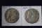 2 Morgan dollars: 1885 O, 1886 O