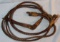 Braided  reins, bull whip and quirt