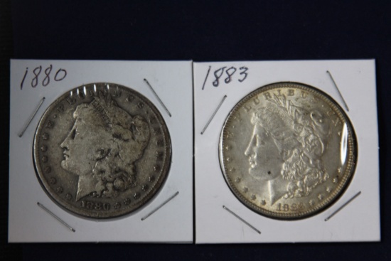 2 Morgan dollars: 1880, 1883