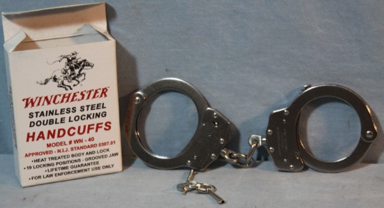 Winchester hand cuffs, new in box and Win. 1894 parts diagram