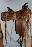 Powder River full stamped saddle, bear trap style, very good condition