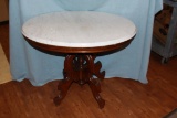 Ornate walnut parlor table w/marble top