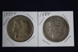 2 Morgan dollars: 1883 O, 1884