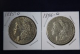 2 Morgan dollars: 1885 O, 1886 O