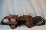 2 vintage single and double loop holsters, F. M. Stern and J. B. Crook make