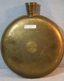Brass bed warmer and wool covered canteen