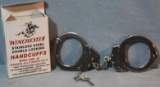 Winchester hand cuffs, new in box and Win. 1894 parts diagram