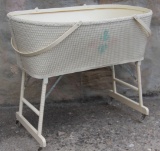 Wicker baby bassinet and wooden rocking cradle