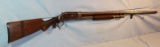 Win. 97 pump shotgun, 12 ga., #586822, small crack in stock, some wood repa