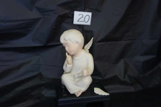 Porcelain "Bisque Angel thinking "  signed by artist  Donjuno   1991 Homco  Mexico broken piece