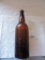 Jung Glass Bottle, BR'C Co., Milwaukee, A B Co. on Bottom, 11 1/4