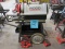 RIDGID 1224 PIPE THREADING MACHINE WITH STAND, PLUS (QTY.2) 1/8'' - 2'' DIE HEADS, AND (QTY.2) 2'' -