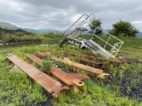 LARGE LOT OF ASSORTED RACKS, UNDERCARRIAGES PARTS, LADDER/CATWALK OFF DRILL, DOZER BLADE SIDE