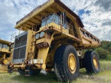 2000 KOMATSU 730E ROCK TRUCK, RIGID FRAME, 130 YARD REAR DUMP, 72,134 HOURS SHOWING, UNIT #324