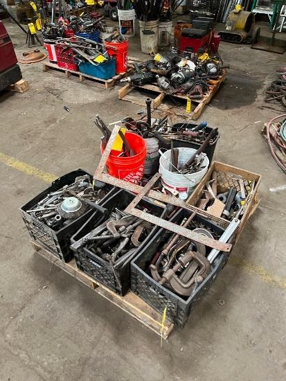 skid of assorted hand tools: C-clamps, vise grips, welding pliers, wrenches, tape measures, screw