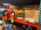 Contents of (3) Bays of Pallet Rack; Stirrups, Electric Cord, First Aid Kits, Safety Vests, Assorted