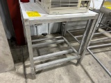 (1) Stainless Table (Missing Legs) & (1) Stainless Table w/ Poly Top ($10 Loading fee will be added