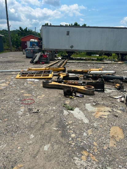 Contents on Parking Lot, Assorted Cat Parts, Hydraulic Cylinders, Sprockets, etc. (LAUREL BRANCH