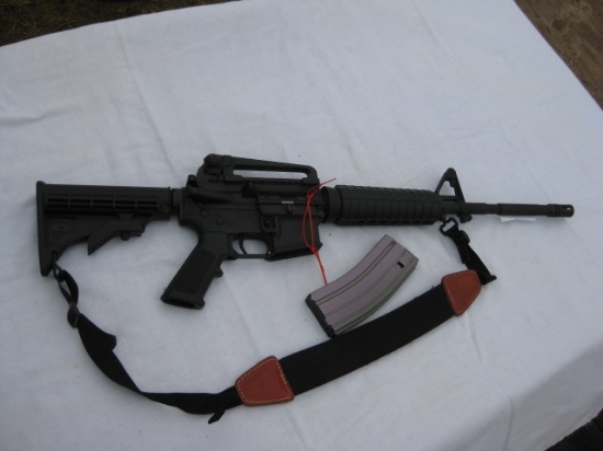 Bushmaster model X7-15E2S s Auto rifle and clip