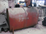 Oil storage tank with retractable hose