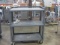 Gray Metal Security Cage on Wheels