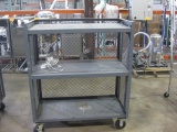 Gray Metal Security Cage on Wheels