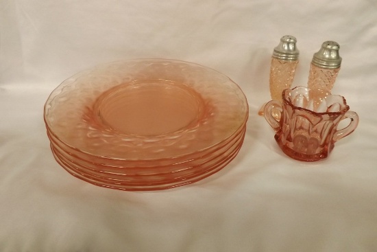 Pink Depression Glass plates, salt/pepper