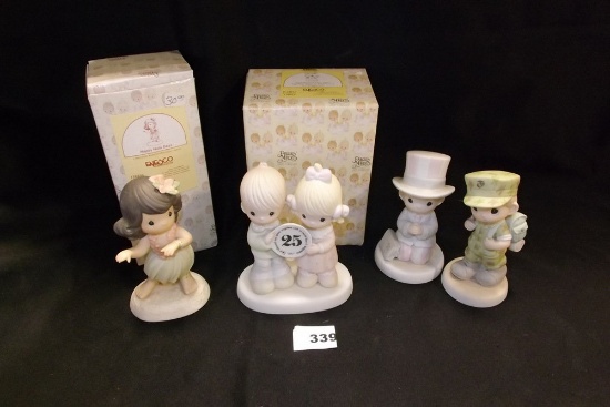 Precious Moments figurines (4)